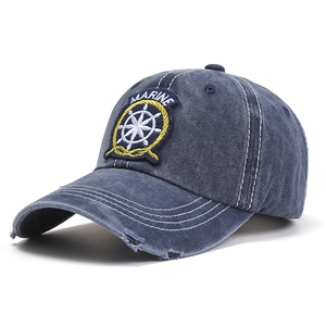 Navy blue washed cotton baseball cap with Marine embroidery and distressed brim detail