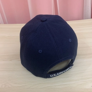 Detail of adjustable velcro strap with U.S. AIR FORCE embroidery on navy baseball cap