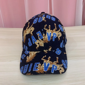 Cotton baseball cap with blue GUIEVP lettering and golden horse patterns in navy blue