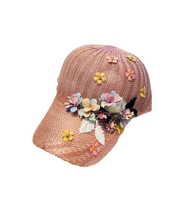 Pink knit floral baseball cap with breathable mesh and 3D handmade flower details