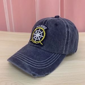 Detail shot of navy washed cotton marine embroidery patch on the vintage baseball cap