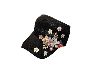 Women's black knitted sun visor hat featuring decorative colorful floral 3D accents