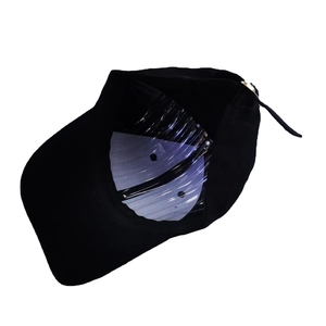Classic black adjustable cotton baseball cap with metal buckle on white background