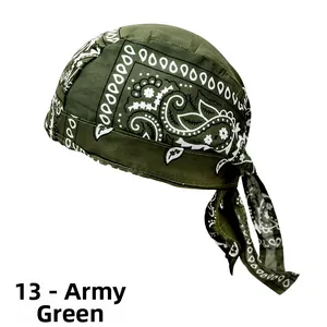 Detail of army green paisley pattern bandana showing fabric texture and long straps