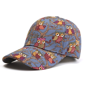 Blue baseball cap with cartoon owl patterns and curved brim for outdoor sun protection