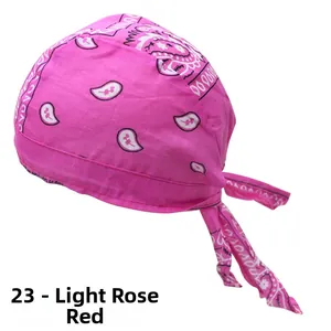Close-up of light rose red paisley cotton pirate hat with adjustable side ties and print