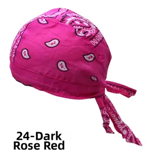 Detail of deep rose red paisley cotton cycling bandana cap with adjustable ties