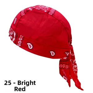 Detailed close-up of bright red cotton paisley bandana cap with athletic ties