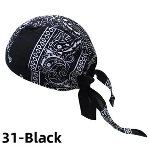 Close-up of black and white paisley pattern on cotton durag with long straps