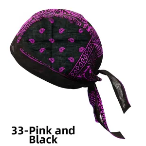 Detail view of rose red and black paisley print bandana cap with adjustable rear straps