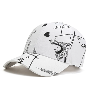 White baseball cap with black Eiffel Tower graffiti and heart patterns for sun protection
