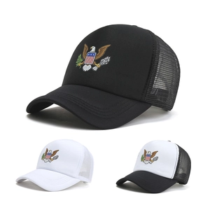 Detail of classic trucker hats with eagle crest embroidery and breathable mesh back