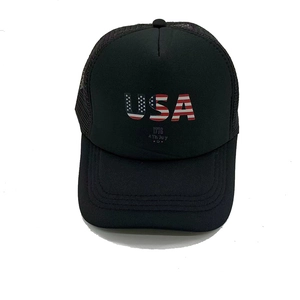 Detail of USA 1776 flag print on black mesh trucker cap with breathable back