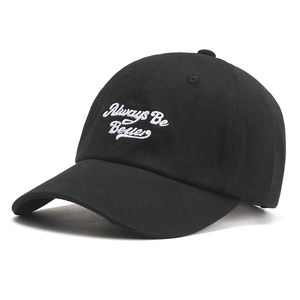Black baseball cap with Always Be Better embroidery in a minimalist Korean style