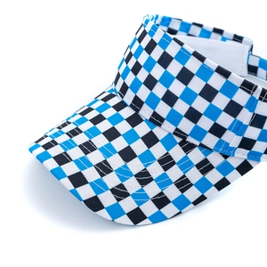 Detail of blue and white checkered visor showing reinforced stitching and canvas texture