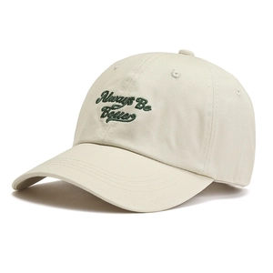 Classic beige cotton baseball cap with green Always Be Better embroidery in clean white background