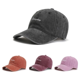 Detailed embroidery of white Everyday script on washed vintage cotton baseball cap