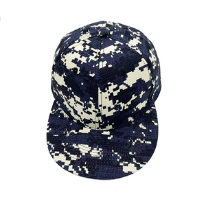 Front view of a flat brim baseball cap featuring a blue and white digital camo pattern