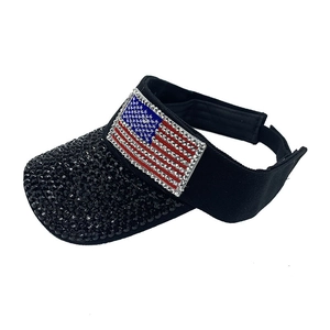 Detail of black sun visor featuring sparkling American flag rhinestones and studded brim