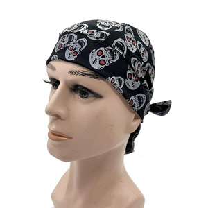 Detail of black skull pattern bandana with red accents for cycling and street dance