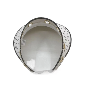 Detailed view of white shell sun hat interior with 100% polyester wash label and eyelets