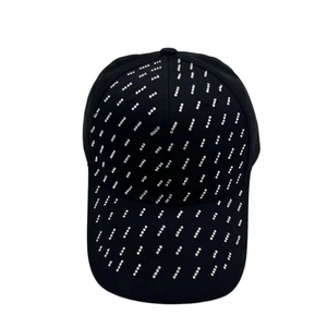 Classic black baseball cap with silver dotted pattern on a curved brim and stylish crown