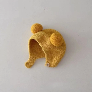 Ginger baby knitted winter hat with cute bear ears and protective ear flaps for warmth