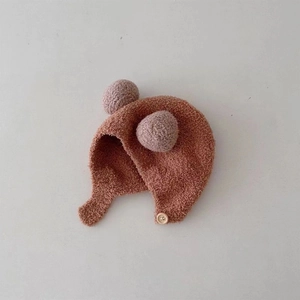 Cute baby winter plush earflap hat with double pom-poms and warm brown teddy fleece