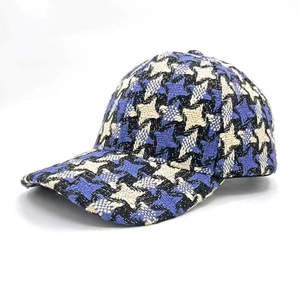 Close-up of the vintage tweed fabric texture and weave of this outdoor baseball cap