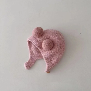 Pink fleece baby winter hat with plush pom-poms and warm ear flaps for toddlers