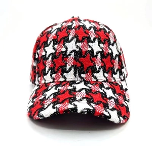 Classic houndstooth winter baseball cap in red and black plaid for outdoor warmth
