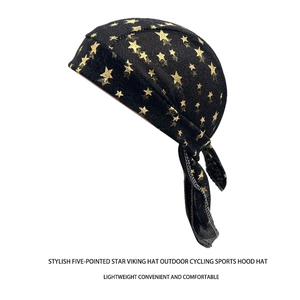 Detail of black cycling bandana with gold star print and long adjustable tail straps