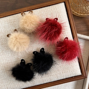 Hollow butterfly earrings with plush fur balls in beige, red, and black color set
