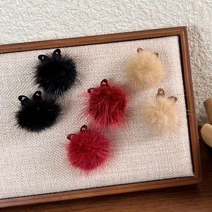 Hollow butterfly earrings with fluffy pom pom balls in black red and beige colors