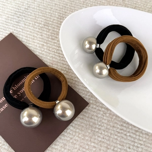 Élastiques à cheveux sans couture avec boules en argent en noir et marron
