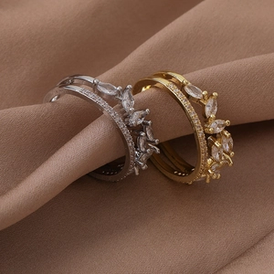 Double-layered leafy ring in gold and silver finish with pavé set zircon stones