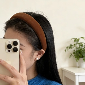 Elegant pumpkin orange velvet padded headband showing high crown style for women