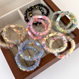 Chic autumn winter colorful knit hair ties with polka dot textures in a gift box