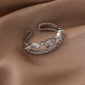 Macro detail of silver double-layered ring with micro-set marquise zircon leaf pattern
