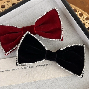 Velvet bow hair clips set with rhinestone edges in black and burgundy red