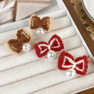 Vintage style red and beige knitted bow earrings with large pearl drops for winter fashion