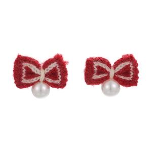 Elegant red knit bow earrings with pearl drops for a festive vintage winter style