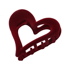 Elegant vintage burgundy flocked heart-shaped hair claw clip with matte velvet texture