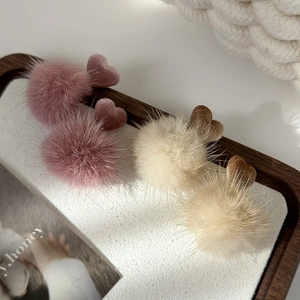 Winter faux fur pompom heart earrings in dusty pink and cream beige colors