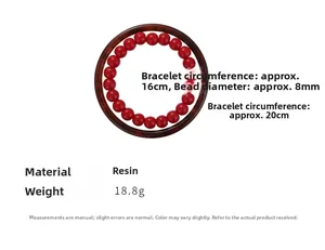 Detailed view of red resin bead bracelet and coffee brown wood grain texture resin bangle