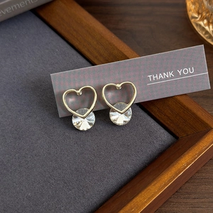 Elegant gold heart earrings with sparkling round cubic zirconia crystals for women