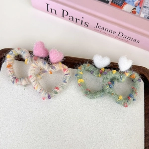 Rainbow yarn wrapped heart earrings in colorful plush wool and unique designer style