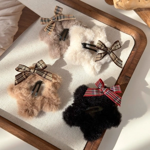 Set of four plush star hair clips with vintage plaid bows in assorted autumn colors