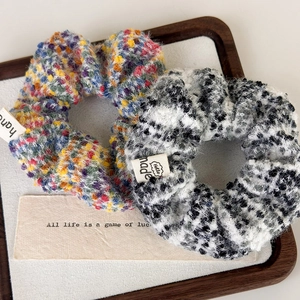 Set of two soft knit scrunchies in colorful mixed patterns and classic tweed style