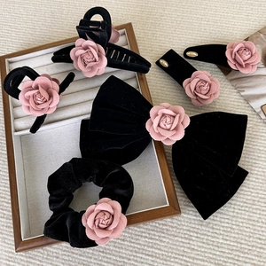 Elegant black velvet hair accessories set with pink fabric camellia flowers for women